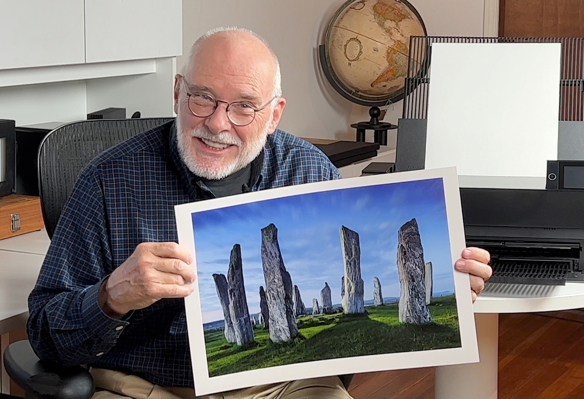 Jim Richardson Holding Print on BII