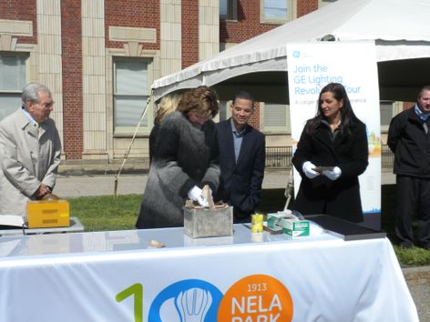 CEO Maryrose Sylvester breaks open a time capsule buried 100 years ago