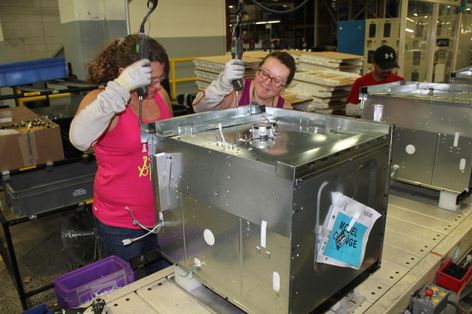 Tosha Jones and Sabrina Walker, employees Roper Corporation plant in LaFayette, Ga.