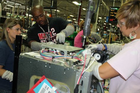 Mindy Daniels, Terry W. Dunaway and Rachel Bowling, employees at the Roper plant in LaFayette, Ga.