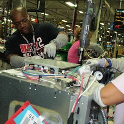 Mindy Daniels, Terry W. Dunaway and Rachel Bowling, employees at the Roper plant in LaFayette, Ga.