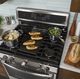 Edge-to-Edge Gas Cooktop with Extra-Large Integrated Reversible Cast Iron Griddle and Grill