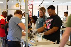 Interns Working on Mock Assembly Line
