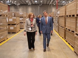 Roper Corp Executive Director Lois Crandell walks GA Gov Kemp through the Southern Logistics Center