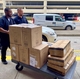 University of Louisville Health team unloads a donation of 2500 N95 masks from GE Appliances