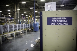 Reminder to Social Distance at a GEA Plant