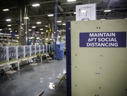 Reminder to Social Distance at a GEA Plant