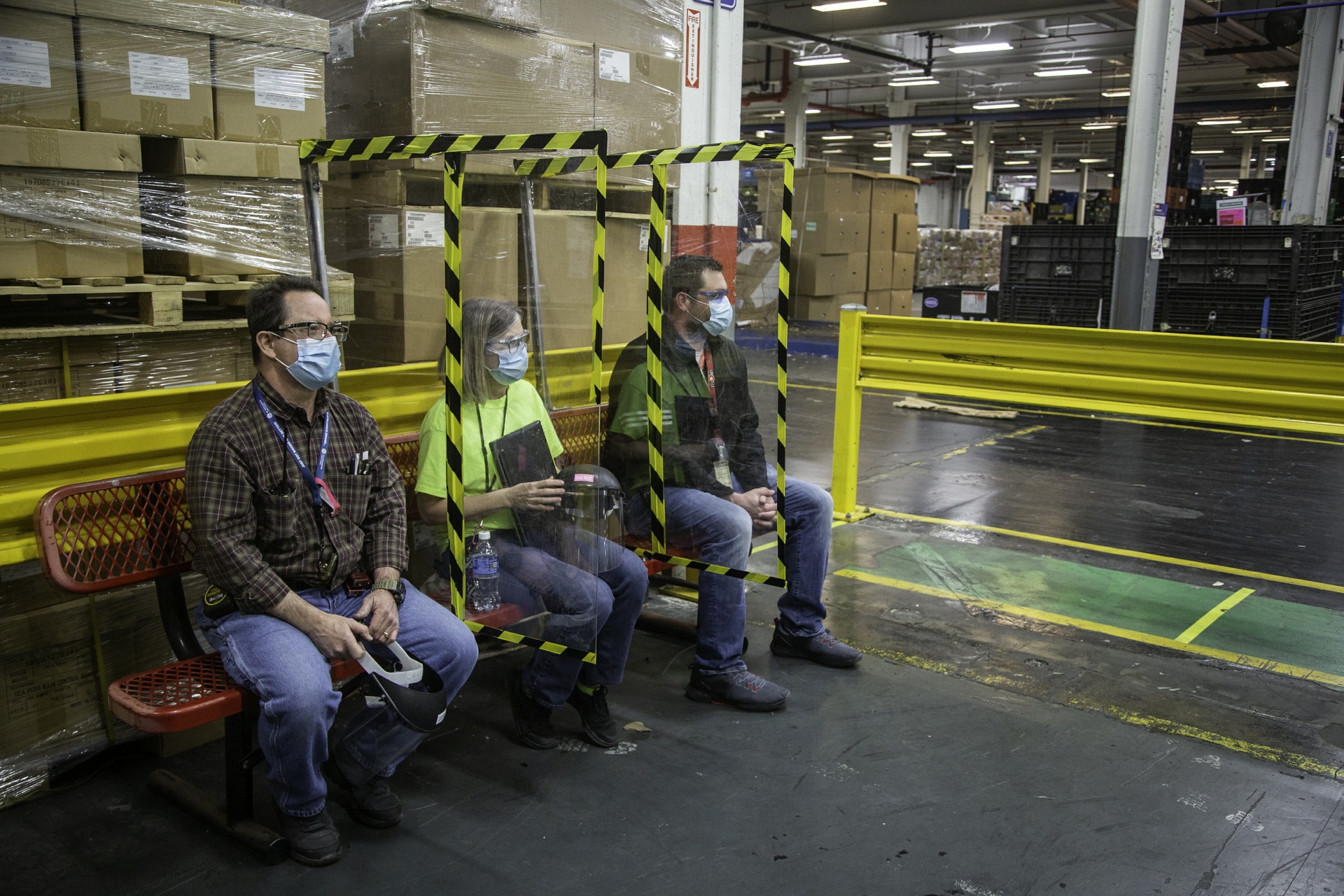 Solid Lexan barriers allow multiple people to safely sit on benches during breaks or for lunch.