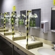 Solid Lexan barriers separate the sinks in the women’s restrooms.