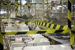 Both a rigid lexan barrier and flexible plastic barrier are used when two people need to work on the same piece of an appliance