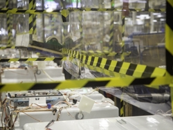 Both a rigid lexan barrier and flexible plastic barrier are used when two people need to work on the same piece of an appliance