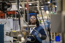 A Monogram  employee works on GE Zoneline® Ultimate V10™ assembly line