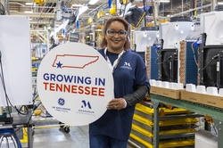 Monogram employee Shelly Wynn celebrates the GE Zoneline® Ultimate V10™ investment
