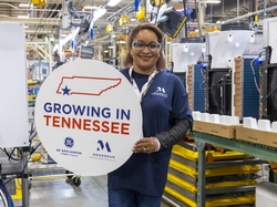 Monogram employee Shelly Wynn celebrates the GE Zoneline® Ultimate V10™ investment