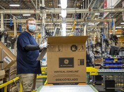 Steven Schwarmer works on the GE Zoneline® Ultimate V10™ line