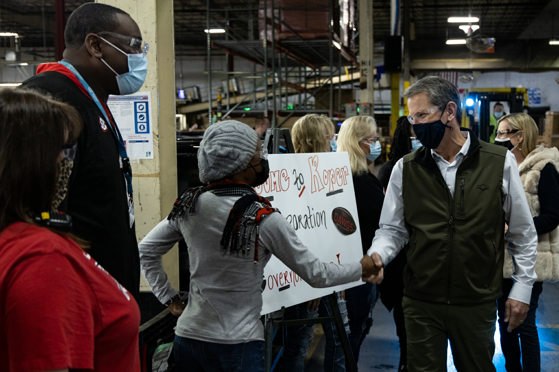 Georgia Gov. Brian Kemp greets employees at Roper Corporation