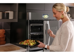 GE Profile 30 smart built-in convection wall oven with an innovative easy-access door design