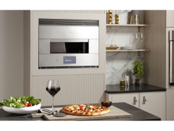 Monogram Smart Flush Hearth Oven's bottom heating element can reach up to 1300 degrees for those who like a crispier pizza crust.