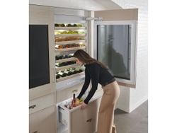 Monogram 30 Fully Integrated Wine Sommelier elevates the look of every wine collection with customizable handles and a seamless panel-ready desig