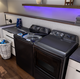 The GE Profile 900 Series Top Load Washer has SmartDispense Technology automatically adjusts the amount of detergent dispensed and Microban antimicrobial technology.