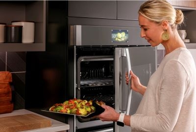 GE Profile 30 smart built-in convection wall oven with an innovative easy-access door design
