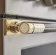 Monogram Designer Collection x Richard Anuszkiewicz Brass Range Handle Detail.