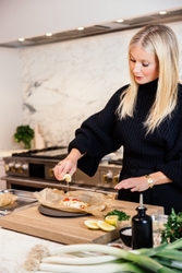Gwyneth Paltrow Makes Halibut Piperade en Pappilote Using the Monogram Steam Oven 
