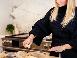 Gwyneth Paltrow Makes Halibut Piperade en Pappilote Using the Monogram Steam Oven 