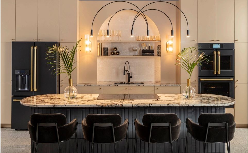 New CAFÉ Brushed Brass Hardware on Matte Black Appliances