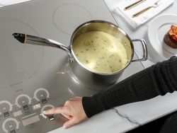 Glide Touch Controls gives owners full control through effortless touch on new Monogram induction cooktop. 