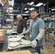 Brandon Hunter, Team Leader at Roper Corporation in LaFayette, GA with James Cochran in the background
