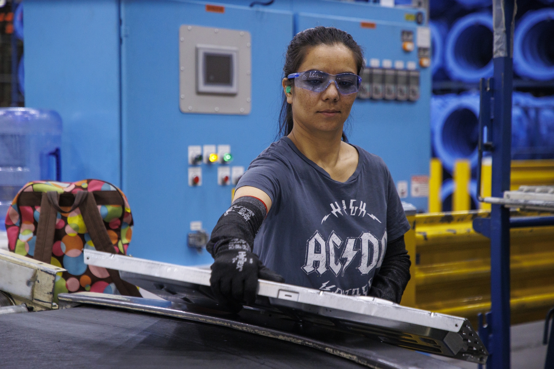 Habiba Sakhizada, a refugee from Afghanistan, was hired as part of the GEA Every Voice Program and builds washers and dryers in AP1
