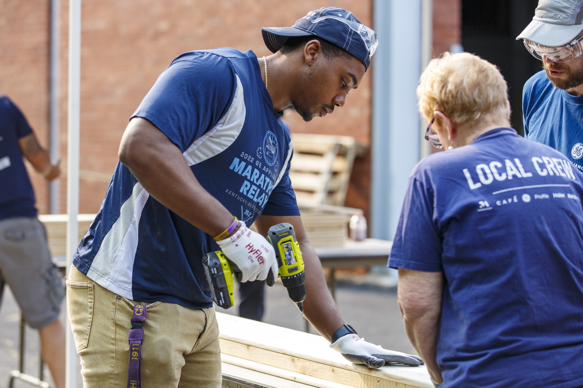 GE Appliances Employees Participate in a Build-a-Bed Volunteer Project. 