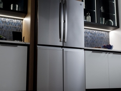GE Profile 28 Cu. Ft. Smart Fingerprint Resistant Quad-Door Refrigerator with Dual-Dispense AutoFill Pitcher Outside