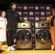 Allison Martin, senior director, Corporate Citizenship, GE Appliances Detroit Pistons Guard Cade Cunningham, Katina Whitlock, senior manager, Community Engagement, GE Appliances stand with an initial set of laundry appliances GE Appliances will donate to Detroit Community Public Schools