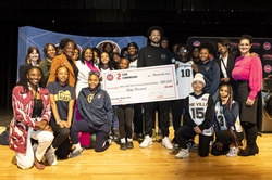 Students of Detroit's East English Village Preparatory Academy at Finney with Detroit Pistons Guard Cade Cunningham and representatives of GE Appliances and the Detroit Public Schools Community  District