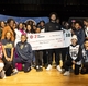Students of Detroit's East English Village Preparatory Academy at Finney with Detroit Pistons Guard Cade Cunningham and representatives of GE Appliances and the Detroit Public Schools Community  District