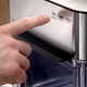Enhanced UI Notifications distinguish between the need to sanitize and descale your unit to ensure optimal ice production in the GE Profile Opal 2.0 Ultra. 