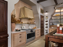 Monogram Designer Collection Features the 48" Dual Fuel Professional Range and Matching Hood in Brass