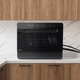 For the countertop configuration, the GE Profile™ Smart Compact Dishwasher doesn't sacrifice storage and can be attached to a faucet and drain into the sink. 
