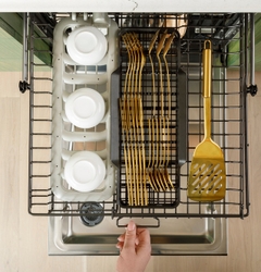 A customizable top rack and basket within the CAFÉ CustomFit Stainless Steel Interior Smart Dishwasher.