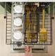 A customizable top rack and basket within the CAFÉ CustomFit Stainless Steel Interior Smart Dishwasher.