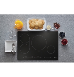 At the touch of a button, multiple burners on the GE Profile Induction Cooktop can turn into an expanded cooking surface – perfect for pancakes.
