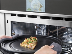 New CAFÉ 30" Smart Five in One Oven with 120V Advantium Technology joins the CAFÉ oven line-up, shown in stainless steel.