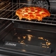 The EasyWash Removable Oven Tray makes clean up effortless and provides an alternative to the traditional cleaning method requiring someone to reach deep within the cavity to scrub the surface.