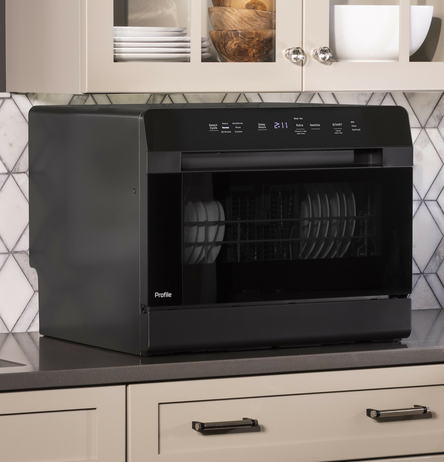 Now available, the GE Profile™ Smart Compact Dishwasher can fit on the countertop, under the sink or built in to cabintery.