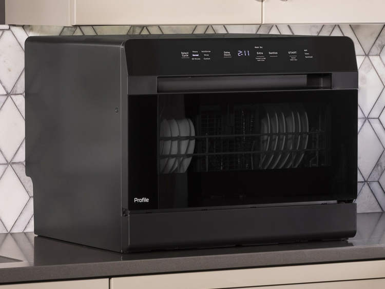Now available, the GE Profile™ Smart Compact Dishwasher can fit on the countertop, under the sink or built in to cabintery. Now available, the GE Profile™ Smart Compact Dishwasher can fit on the countertop, under the sink or built in to cabintery.
