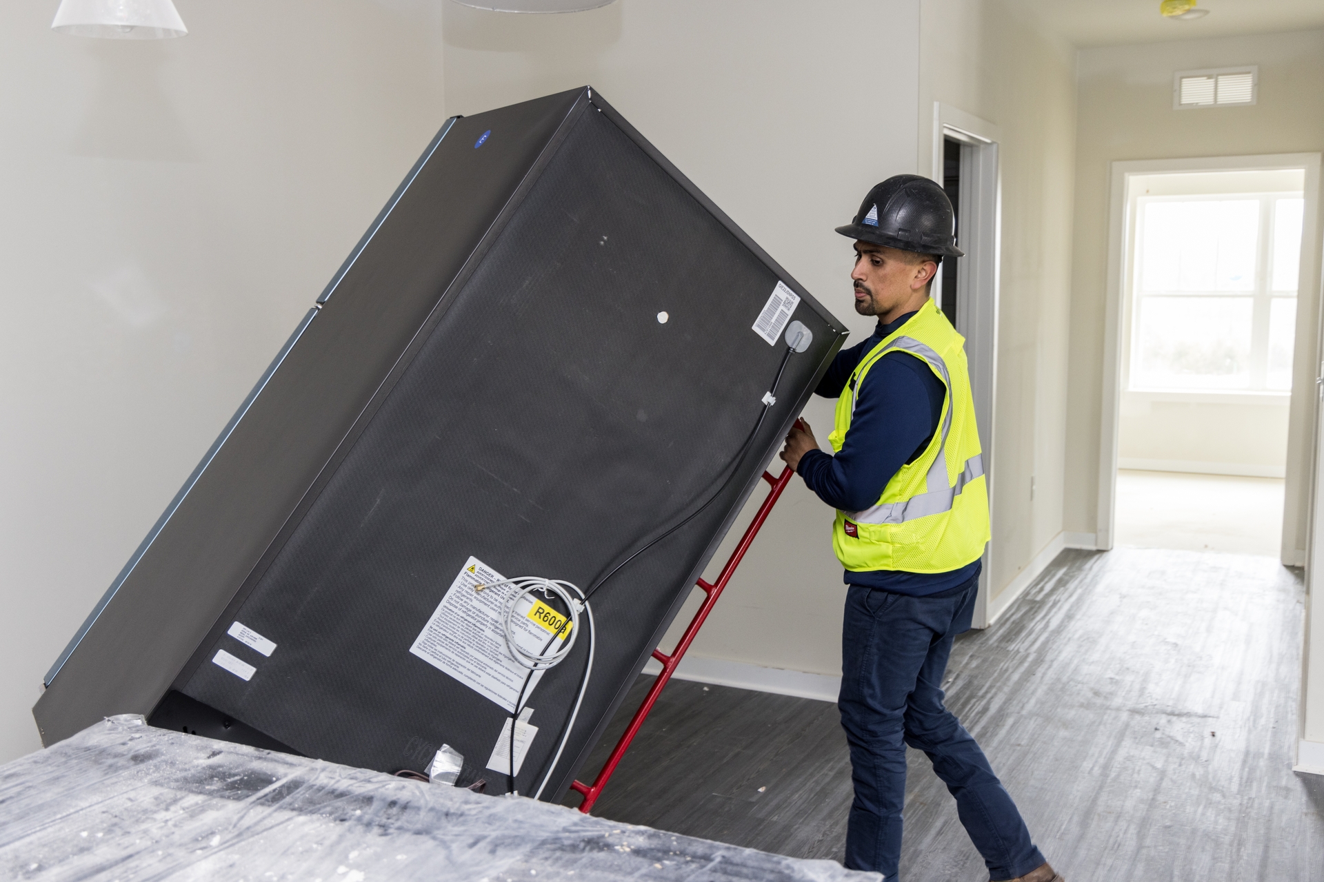 GE Appliances installs a refrigerator that expands access to safe fresh food storage.