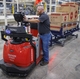 One new job created is the robot wrangler held by Scott Samples.