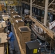 Employees box up completed refrigerator units at the Decatur Refrigeration Plant in Decatur Alabama